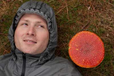 Jesse Rivest with a mushroom, by Aaron Burgess
